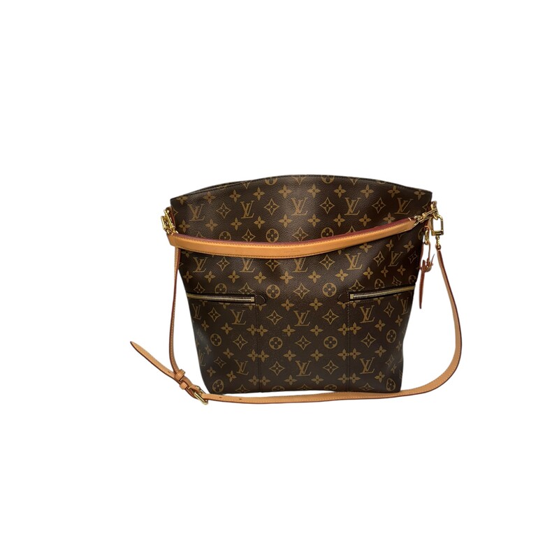 LOUIS VUITTON Monogram Melie. This chic hobo bag is finely crafted of classic Louis Vuitton monogram coated canvas in brown. The bag features zipper pockets on either side, a vachetta leather top handle, and a removable, adjustable vachetta leather shoulder strap with polished gold hardware. The top is open to a deep purple microfiber interior with patch pockets.<br />
Dimensions:<br />
Base length: 12 in<br />
Height: 13.75 in<br />
Width: 4.5 in<br />
Drop: 3.5 in<br />
Drop: 14 in<br />
Date Code: SA0188<br />
<br />
Some water marks on tag shown in photo.