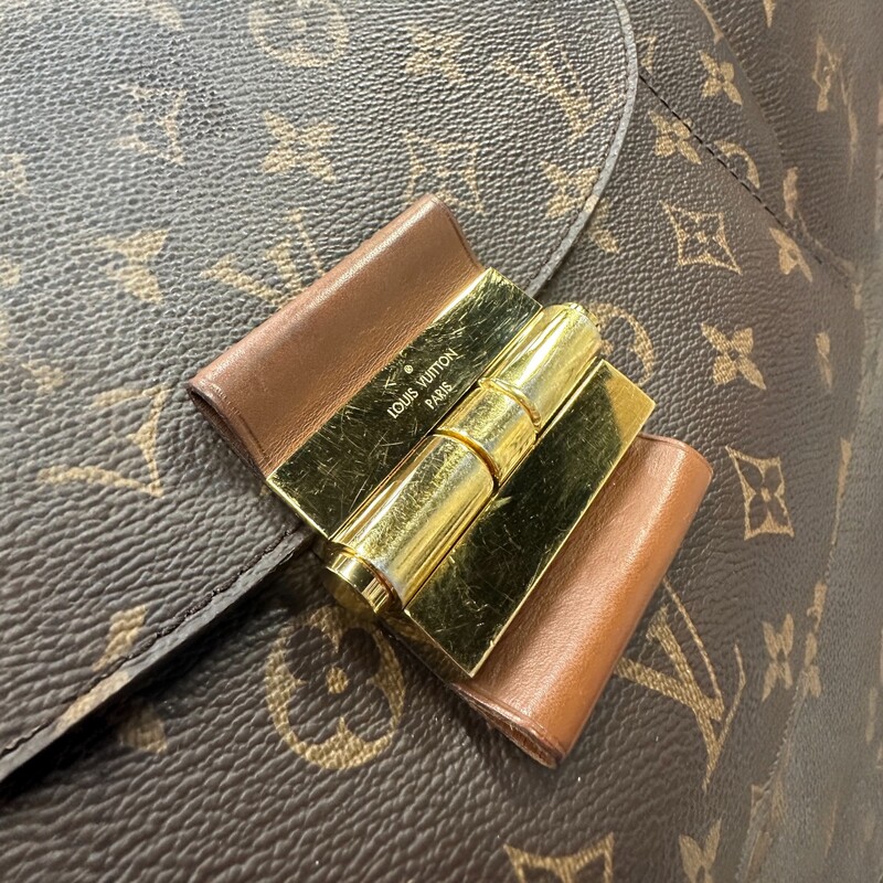 Louis Vuitton Olympe<br />
 Monogram<br />
 Size: MM<br />
<br />
Dimensions:<br />
Length: 15.5 in<br />
Width: 5.25 in<br />
Height: 11 in<br />
Drop: 6.5 in<br />
<br />
Date Code:<br />
SP2514<br />
<br />
Note: Scratching to hardware and minor scuffs on canvas.