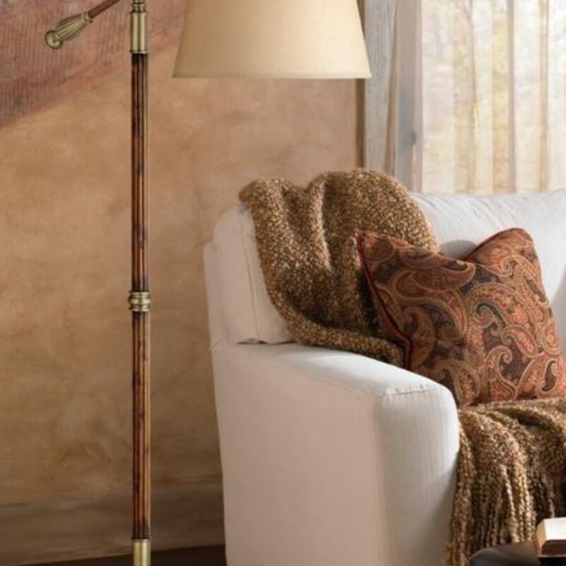 Uttermost Monroe Rustic Vintage Arc Lamp
Brown Gold Tan Size: 39 x 60-67H
Retails: $399.99

Adjustable height from 60 to 67. Base is 9 1/4 square. Shade is 12 across the top x 14 1/2 across the bottom x 8 high. Weighs 23 lbs.
15 from handle to center pole. 32 1/2 from handle to center shade. 39 total arm length to outside of shade.
Uses one maximum 150 watt standard-medium base light bulb (not included). On-off step switch on the cord.
Adjustable arc floor lamp by the Uttermost brand.
Brass finish metal accents. Wood construction pole. Burlap fabric lamp shade.