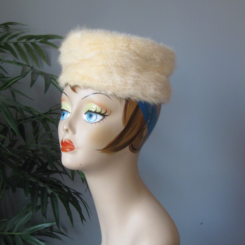 Gorgeous 1950s fur pillbox hat.  I believe it is white mink.<br />
It was made by famous design house Schiaraperelli.<br />
The hat has an elegant folded satin top and lining<br />
<br />
It measures aproximately 20.5 around on the inside.  This hat may be perched more on the back of the head than straight on.<br />
Excellent vintage condition.<br />
perfect condtion.<br />
Thank you for looking.<br />
#80082