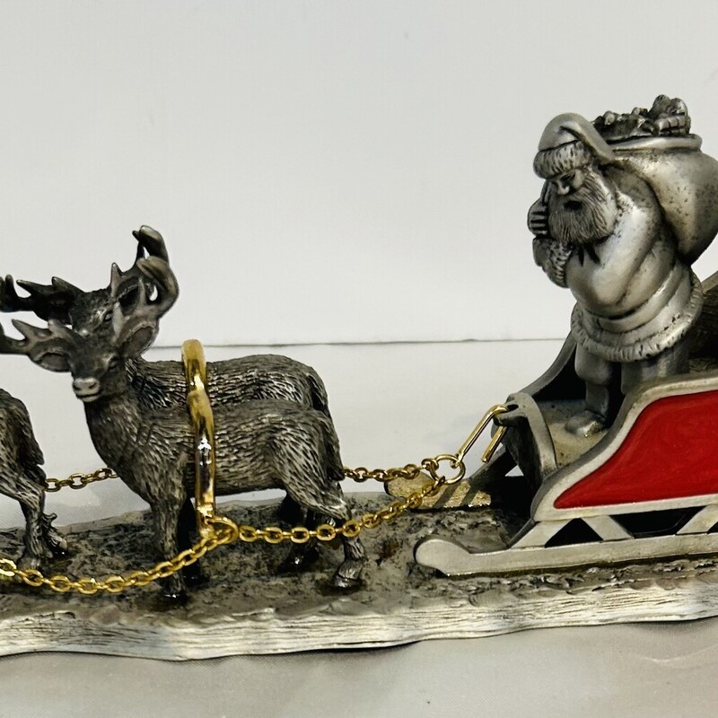 Fort Pewter Santa's On His Way
Silver Red Gold
Size: 2.5 x 7 x 3H