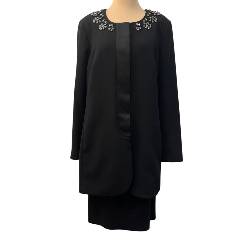 CAbi Symphony Jacket Skirt Set<br />
Gorgeous Rhinestone Detail<br />
Beautiful Lapel<br />
Pencil Skirt with Seam Detail<br />
Color:  Black<br />
Size: 16