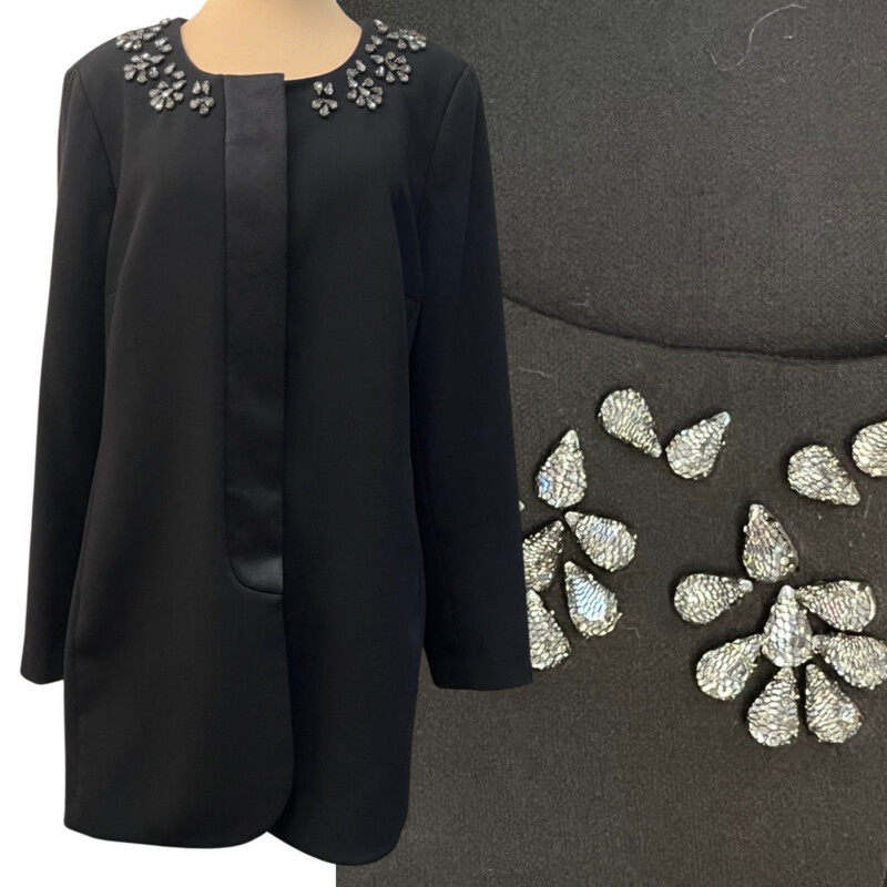 CAbi Symphony Jacket Skirt Set<br />
Gorgeous Rhinestone Detail<br />
Beautiful Lapel<br />
Pencil Skirt with Seam Detail<br />
Color:  Black<br />
Size: 16