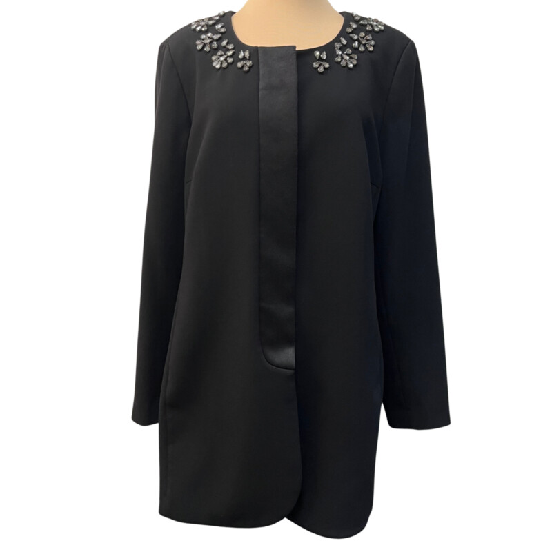 CAbi Symphony Jacket Skirt Set<br />
Gorgeous Rhinestone Detail<br />
Beautiful Lapel<br />
Pencil Skirt with Seam Detail<br />
Color:  Black<br />
Size: 16