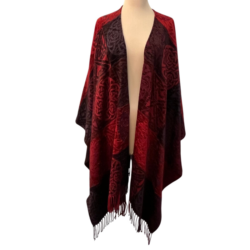 New Calzeat Celtic Ruana<br />
New With Tags<br />
Woven Celctic Design<br />
Wool Blend with Fringe Detail<br />
Designed and Woven in Scotland<br />
Colors:  Red and Plum<br />
Retails for $161.00