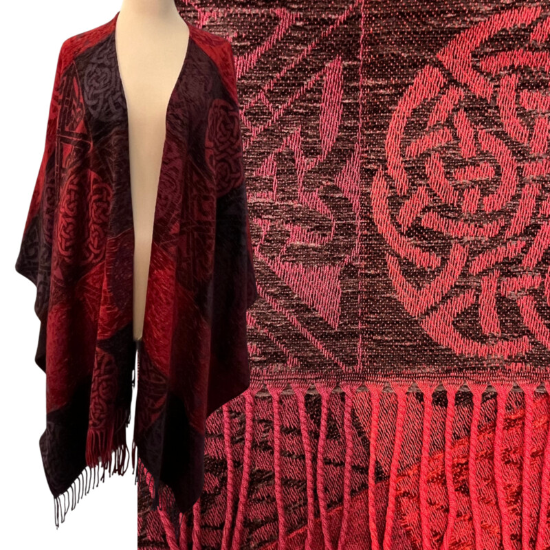 New Calzeat Celtic Ruana
New With Tags
Woven Celctic Design
Wool Blend with Fringe Detail
Designed and Woven in Scotland
Colors:  Red and Plum
Retails for $161.00