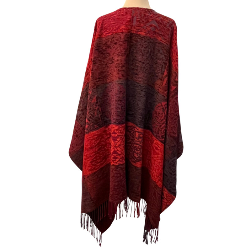 New Calzeat Celtic Ruana
New With Tags
Woven Celctic Design
Wool Blend with Fringe Detail
Designed and Woven in Scotland
Colors:  Red and Plum
Retails for $161.00