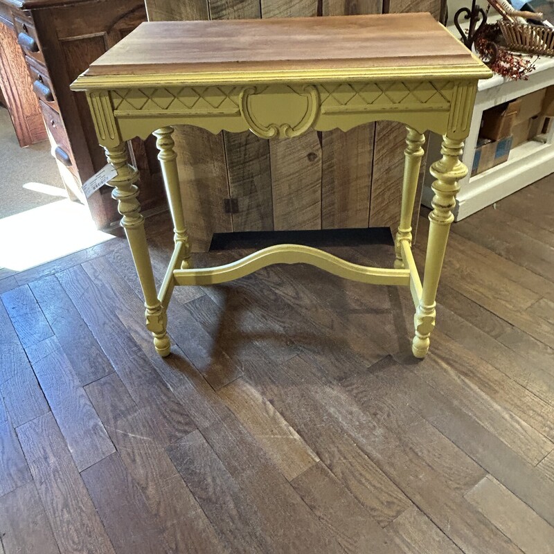 Yellow Side Table,
Size: 29x16x29
Very nicely painted side table that use to be a sewing table.  The top is the original wood.