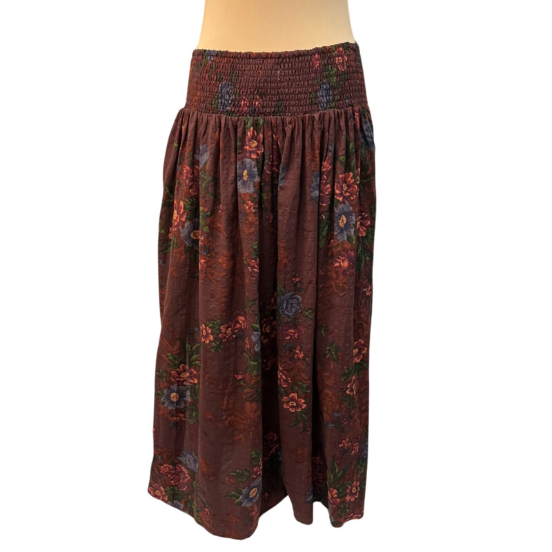 New Natural Life Skirt<br />
Cotton Blend<br />
Comfort Waist<br />
Floral Print<br />
Burgandy, Green, Peach, Red and Purple<br />
Size: Large