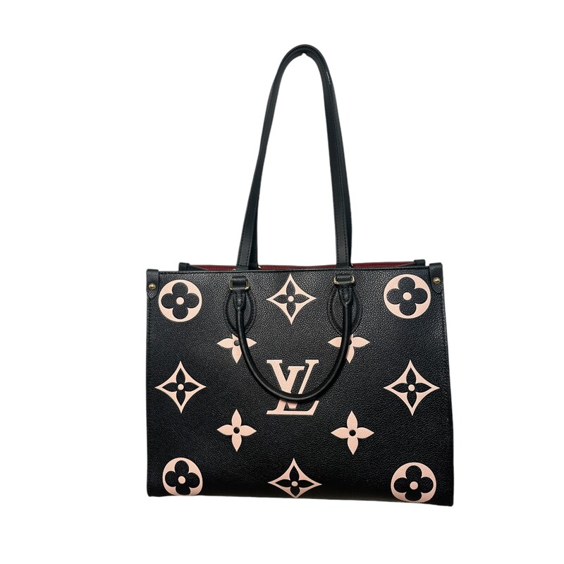 Louis Vuitton Bicolor Empreinte OnTheGo MM<br />
Black Bicolor Empreinte<br />
Printed<br />
Brass Hardware<br />
Rolled Handles & Dual Shoulder Straps<br />
Suede Lining & Three Interior Pockets<br />
Clasp Closure at Top<br />
Date Code: DU3240<br />
<br />
Dimensions:<br />
Handle Drop: 5<br />
Height: 10.75<br />
Width: 13.75<br />
Depth: 6<br />
<br />
Code:DU3240<br />
<br />
Does not include original dust bag or box.