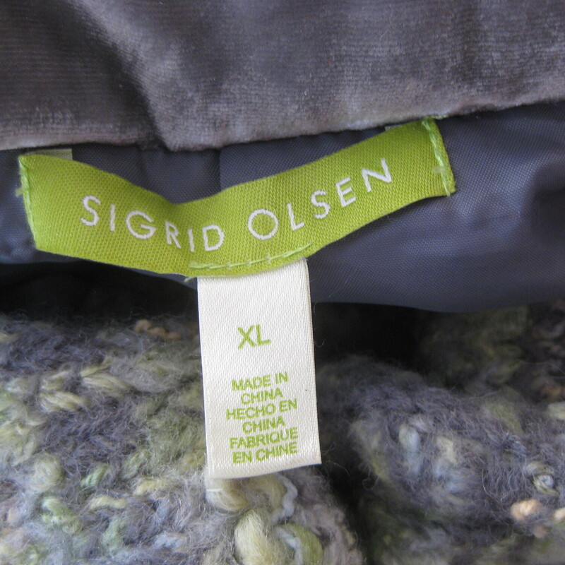 Sigrid Olsen Tweed, Grayee, Size: XL<br />
Quality car length coat by Sigrid Olsen.<br />
Made of soft fuzzy wool blend fabric in a soft green gray plaid.<br />
Trimmed with romantic gray velvet at collar and cuffs.<br />
Fully lined<br />
Pockets<br />
nice large plastic buttons.<br />
Size XL<br />
Flat measurements:<br />
shoulder to shoulder: 16.5<br />
armpit to armpit: 22.5<br />
waist area: 21<br />
hip area: 25.5<br />
length: 36.5<br />
underarm sleeve seam: 18<br />
<br />
excellent condition, no flaws found<br />
thanks for looking!<br />
#80695