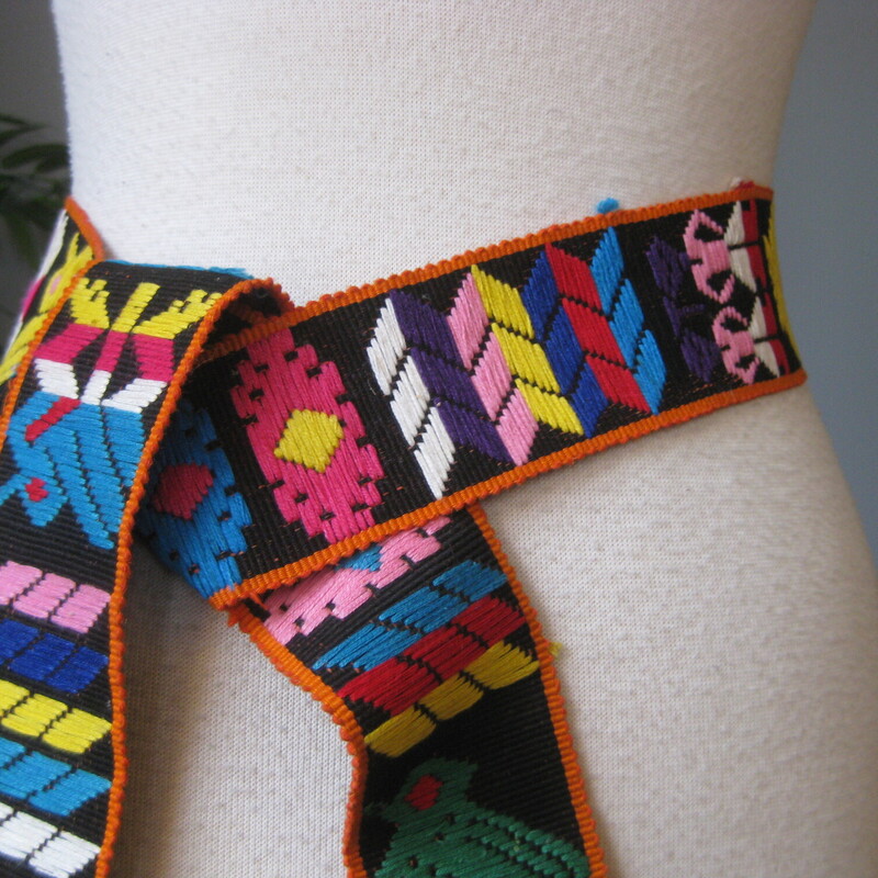 Mexican? Embrd, Multi, Size: None<br />
Brightly colored sash belt.  A thick black cotton base is embroidered with abstract and geometric shapes in jewel tones.  It has a braided black tassel at each end.  65 long not including the tassels at the ends.<br />
no tags or labels are present.<br />
Thanks for looking<br />
#79505