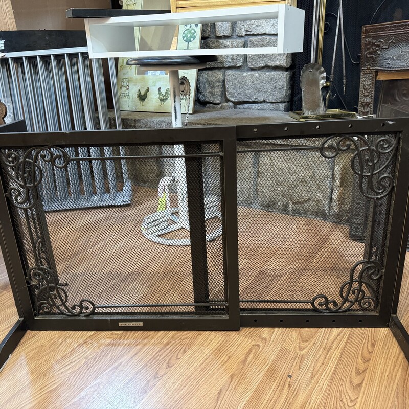 Metal Fireplace Screen

Sturdy metal fireplace screen with scroll designs on corners.

Size: 41 in long X 10 in deep X 22 in high