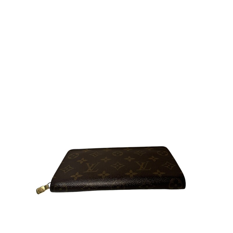 Louis Vuitton Monogram Zip Wallet<br />
Date Code: TH0012<br />
Does not come with original dust bag or box.