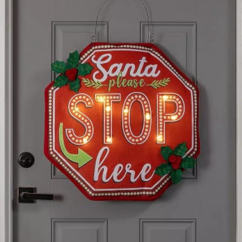 Lit Santa Please Stop Here Door Sign
 Xmas Colors
Size: 25x1.25x25
Includes interior lights & attached hanging wire
Product weight: 0.58 lbs.
Uses 3 AA batteries
Polyester
Spot clean
NEW
Retail $54