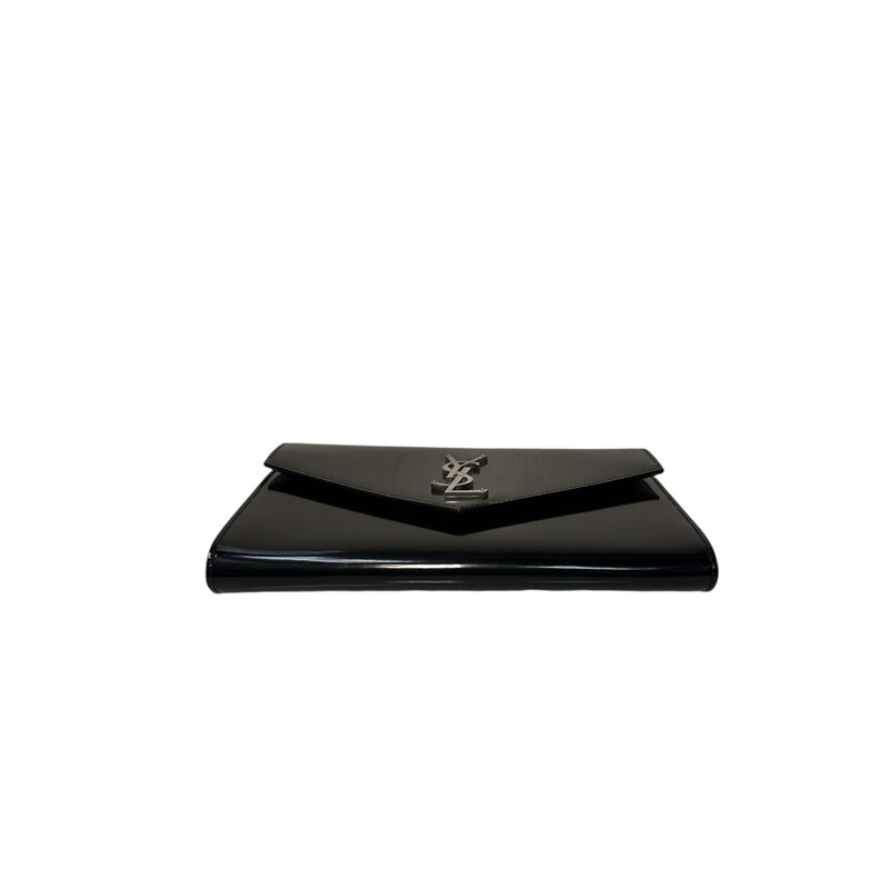 Saint Laurent Cassandre<br />
Shiny Black Leather<br />
Snap-button closure<br />
One main interior compartment, one flat pocket<br />
Grosgrain lining<br />
Silver hardwear<br />
Dimensions: 8.2W x 1.1D x 6.3H<br />
Code: GNC 760097.0923<br />
<br />
Comes with original dust bag and box.