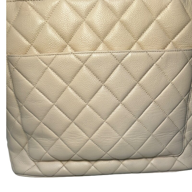 Chanel Medallion Cream Tote<br />
<br />
Note: Wear to corners. Light wear to upper leather trim.<br />
<br />
Date Code: 4826275<br />
<br />
Dimensions:<br />
Handle Drop: 6<br />
Height: 10.25<br />
Width: 11<br />
Depth: 5.75