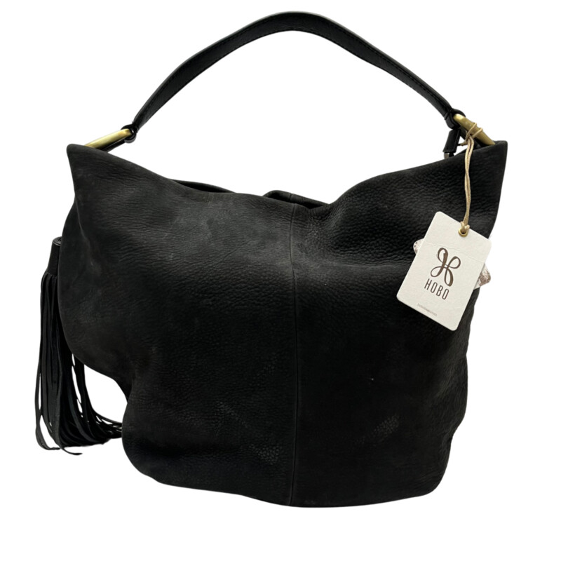 New Hobo Meridian Black Handbag
A bohemian-inspired hobo silhouette made for women who love oversized, slouchy, relaxed bags. Crafted in in velvet hide, the leather is irresistibly soft and falls in a natural, carefree way.
Old English Brass hardware
Zip closure
Exterior: Side zip pocket, back slip pocket with hidden magnet closure
Interior: 2 slip pockets and zip pocket with slip and pen pocket on top
fits up to iph7+
Wanderlust lining
Polyester Interior