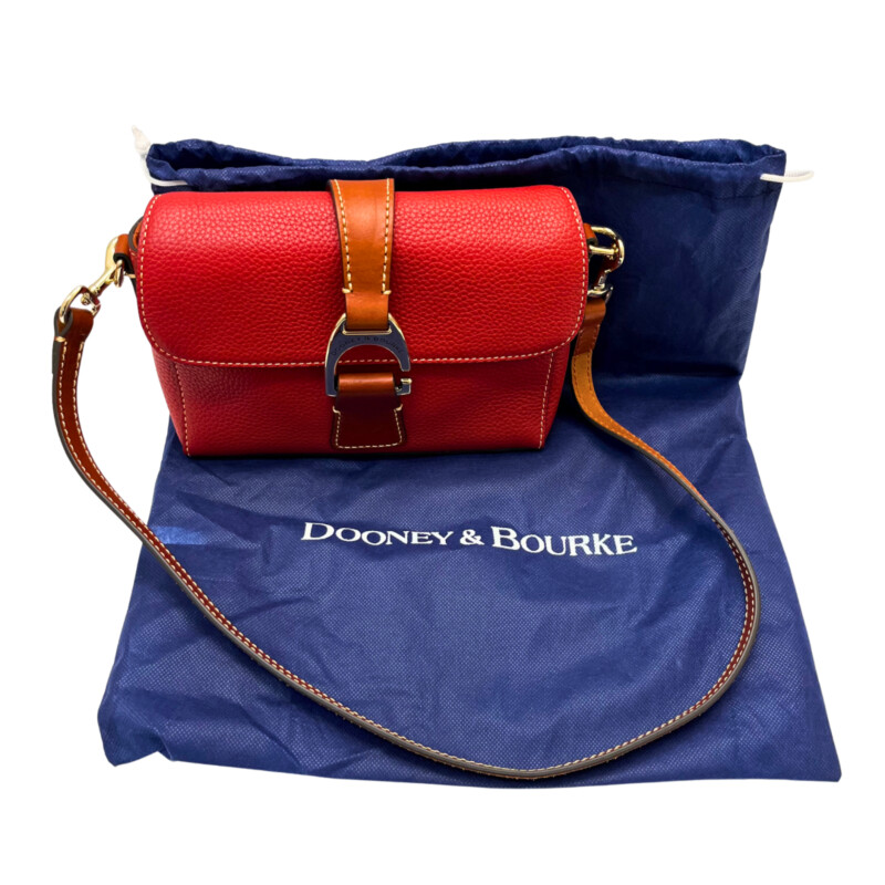 Dooney&Bourke Saffiano Kyra Bag<br />
Custom Italian hook & loop closure.<br />
Detachable Shoulder strap. Strap drop length: 13.5.<br />
H 5.5 x W 2.75 x L 8.5<br />
Designed in Norwalk, CT by Peter Dooney.<br />
One inside zip pocket. One inside pocket.<br />
Inside key hook.<br />
Lined.<br />
Color: Red