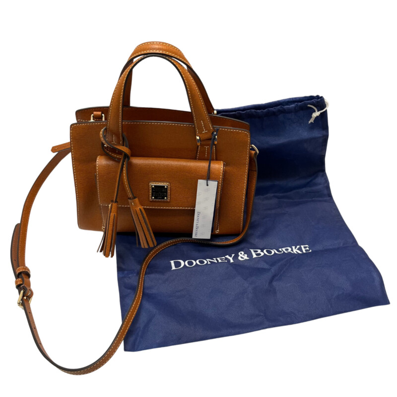 Dooney&Bourke Nana Satchel<br />
Italian Saffiano leather.<br />
Zipper closure.<br />
Detachable strap. Strap drop length: 23.25.<br />
H 7.75 x W 5 x L 10.5<br />
1 lb 10 oz<br />
Color: Natural<br />
Designed in Norwalk, CT by Peter Dooney.<br />
One outside pocket. Two inside slip pockets.<br />
One inside zip pocket.<br />
Inside key hook.<br />
Lined.<br />
Feet.