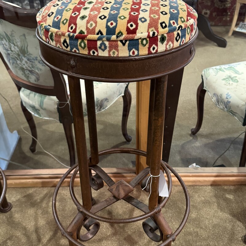 Wrought Iron Bar Stool
Brown Iron with Printed Cushion, Scroll Bottom
Not Adjustable
Base is 20 Inches Round, Seat is 16 Inches Round, 33 Inches High