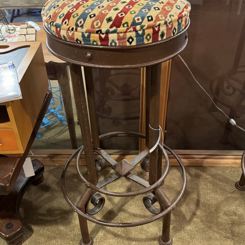 Wrought Iron Bar Stool
Brown Iron with Printed Cushion, Scroll Bottom
Not Adjustable
Base is 20 Inches Round, Seat is 16 Inches Round, 33 Inches High