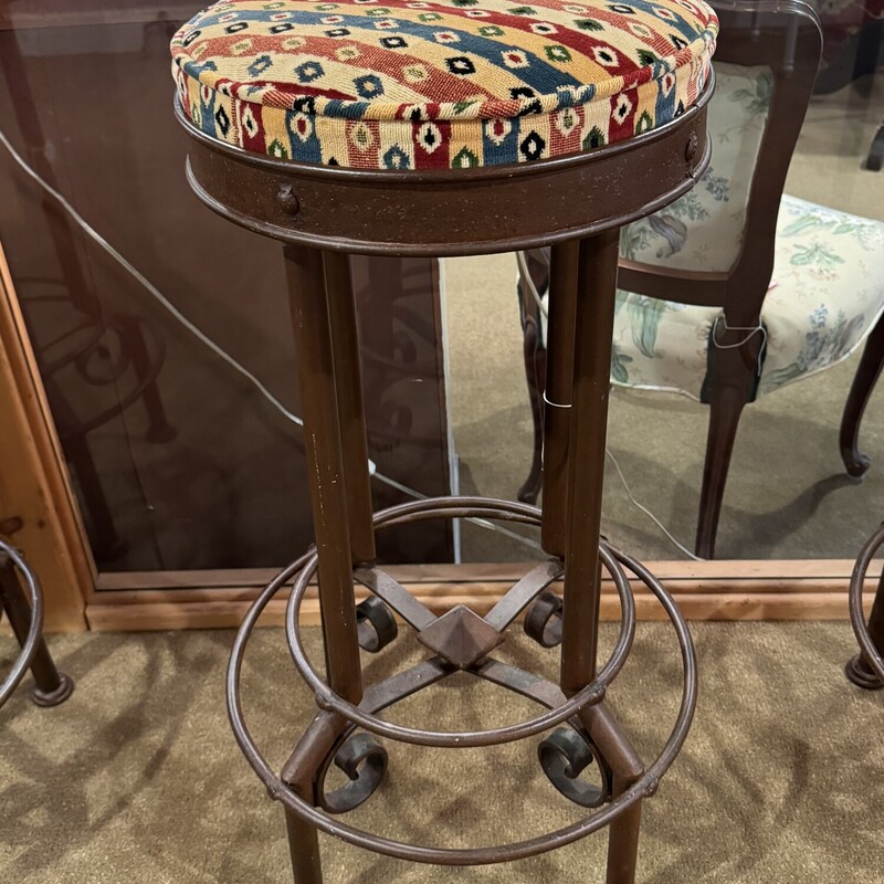 Wrought Iron Bar Stool
Brown Iron with Printed Cushion, Scroll Bottom
Not Adjustable
Base is 20 Inches Round, Seat is 16 Inches Round, 33 Inches High