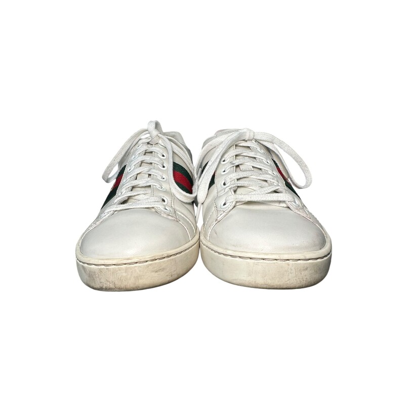 Gucci Ace Sneakers<br />
White<br />
Size: 37.5<br />
<br />
Note: Bleeding on the back from the leather dye.<br />
<br />
431942<br />
<br />
Does not include original dustbag or box.