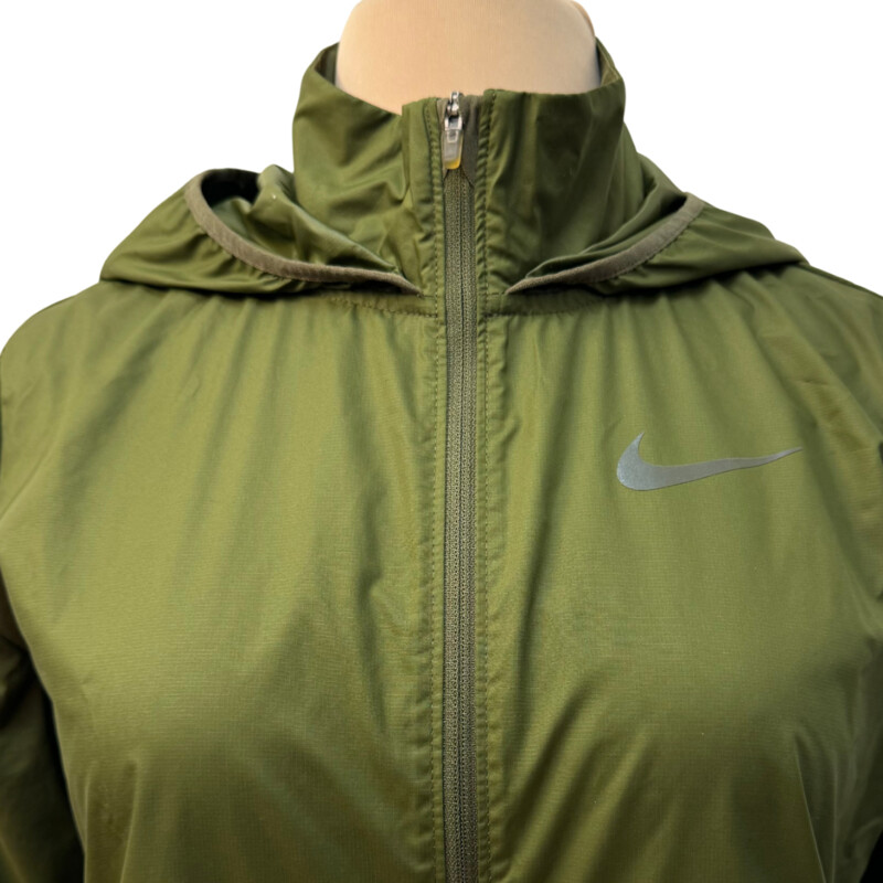 Nike Repel Jacket<br />
Hooded<br />
Back Air Vents<br />
Two Zippered Pockets<br />
Color: Olive<br />
Size: XS