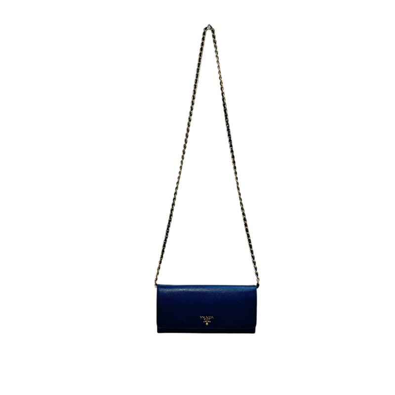 Prada Wallet On Chain Crossbody  Blue<br />
 Size: OS<br />
<br />
Factory code: 198<br />
<br />
Dimensions:<br />
Length: 8.25 in<br />
Height: 4.25 in<br />
Width: 1 in<br />
Drop: 21 in<br />
<br />
Wear on corners and scratching throughout bag.<br />
Does not come with original box or dust bag.