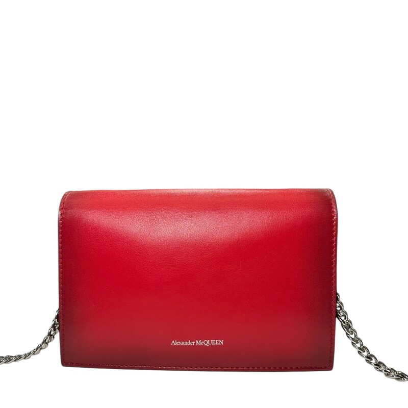 Alexander Mcqueen Red Skull Crossbody<br />
Calfskin<br />
 Dimensions: 5.1 Lx7.9W<br />
<br />
Comes with original dust bag.