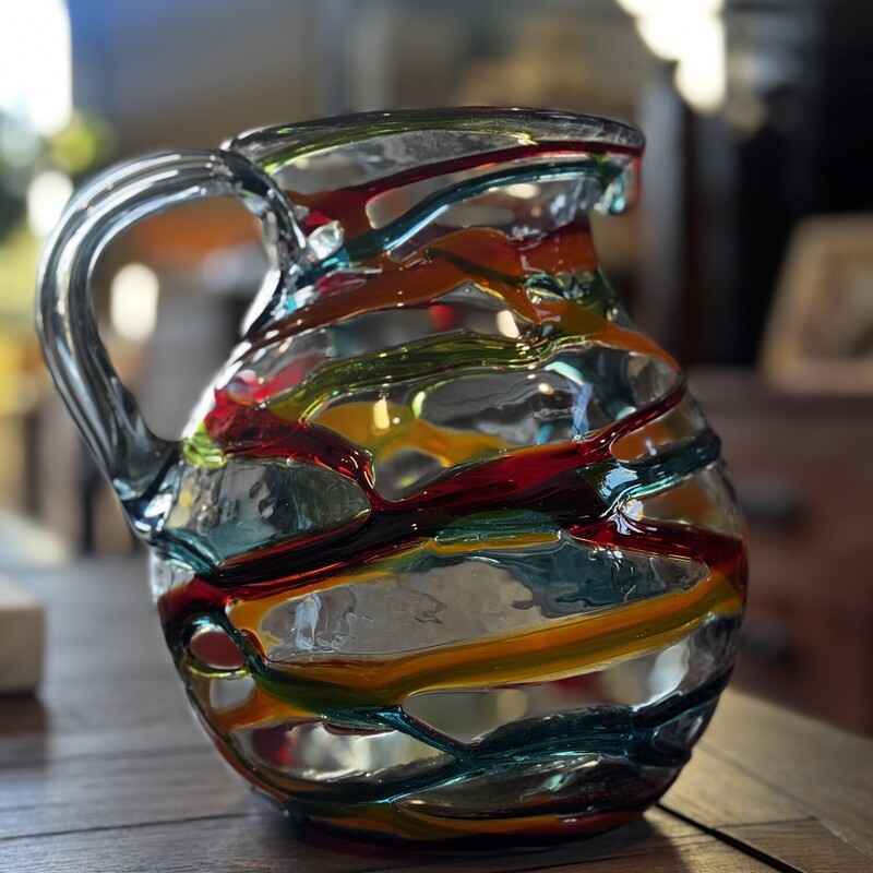 Hand Blown Glass Pitcher

Size: 9Tx9W