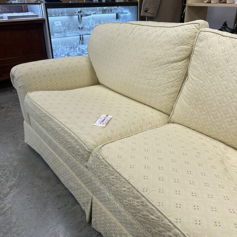 Down-Filled Loveseat - super comfortable! Yellowish/cream upholstery.<br />
Size: 76in L