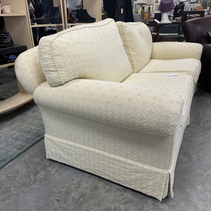 Down-Filled Loveseat - super comfortable! Yellowish/cream upholstery.<br />
Size: 76in L