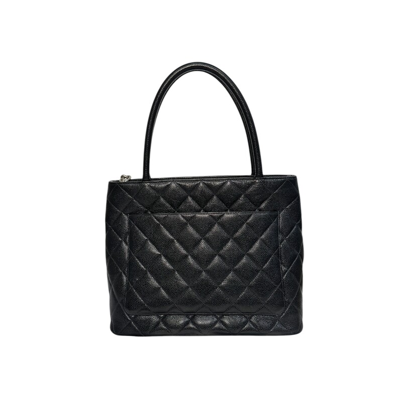 Chanel Medallion Tote, Black, Size: OS<br />
<br />
Date Code: 6892748<br />
<br />
Dimensions:<br />
12W x 9H x 6D<br />
7 handle drop<br />
6.5 strap drop<br />
<br />
Light wear to tht corners. Wear on the inside.<br />
<br />
Does not come with original dust bag or box.