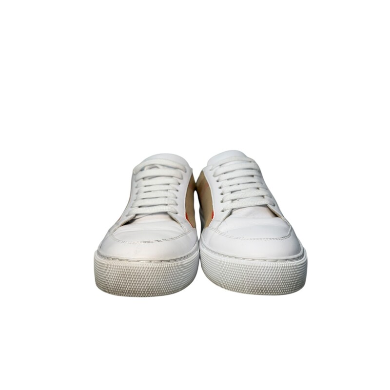 Burberry House Sneakers<br />
 White<br />
 Size: 38<br />
<br />
Light marks on the shoes and creasing.<br />
<br />
Does not come with original dust bag or box.