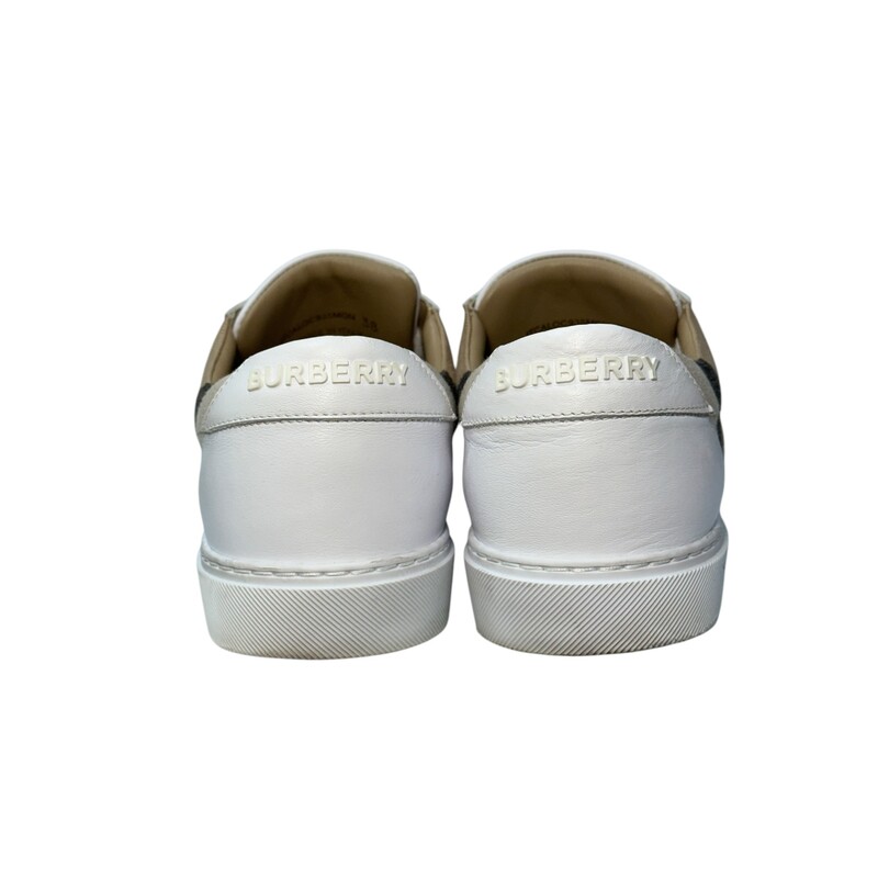 Burberry House Sneakers<br />
 White<br />
 Size: 38<br />
<br />
Light marks on the shoes and creasing.<br />
<br />
Does not come with original dust bag or box.