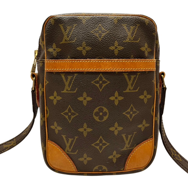 Louis Vuitton Danube Crossbody<br />
Quality Leather with Monogram Print<br />
Brown Coated Canvas<br />
Brass Hardware<br />
Leather Trim<br />
Single Adjustable Shoulder Strap<br />
Leather Trim Embellishment & Single Exterior Pocket<br />
Leather Lining & Single Interior Pocket<br />
Zip Closure at Top