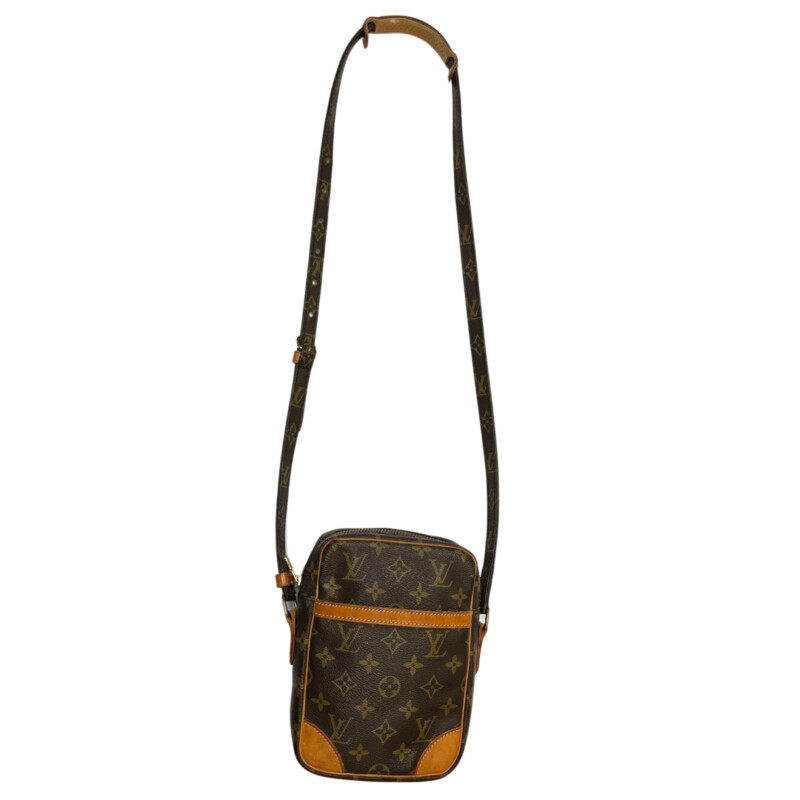 Louis Vuitton Danube Crossbody<br />
Quality Leather with Monogram Print<br />
Brown Coated Canvas<br />
Brass Hardware<br />
Leather Trim<br />
Single Adjustable Shoulder Strap<br />
Leather Trim Embellishment & Single Exterior Pocket<br />
Leather Lining & Single Interior Pocket<br />
Zip Closure at Top