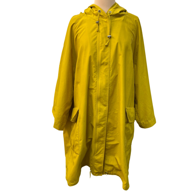 Eileen Fisher Raincoat<br />
Hooded with Zip and Button Closure<br />
Wider Sleeves for Easier Layering<br />
Pockets with Two Ways to Use<br />
Color: Mustard<br />
Size: 2X