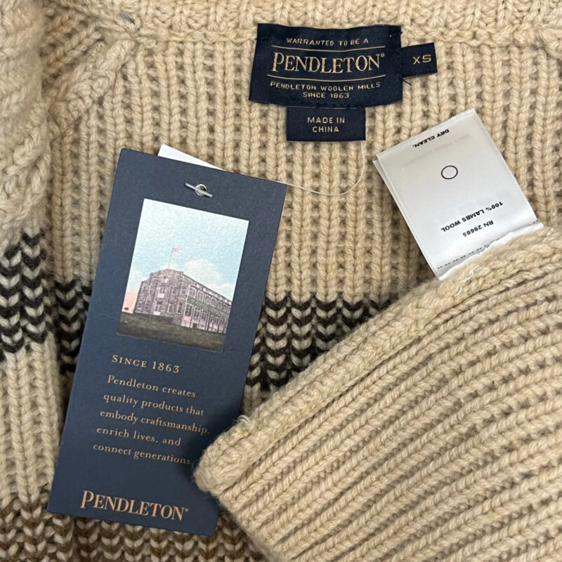 New Pendleton Long Westerly Cardigan<br />
100% Lambs Wool<br />
Zipper Closure<br />
With Pockets<br />
Colors: Tan, Coffee and Brown<br />
Size: XS<br />
Retails for $259.00