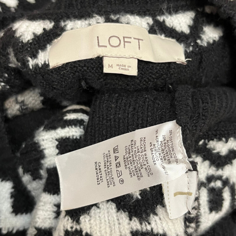 LOFT Sweater Dress<br />
Fair Isle Style<br />
Cotton Blend<br />
Color: Black, White, and Gray<br />
Size: Medium