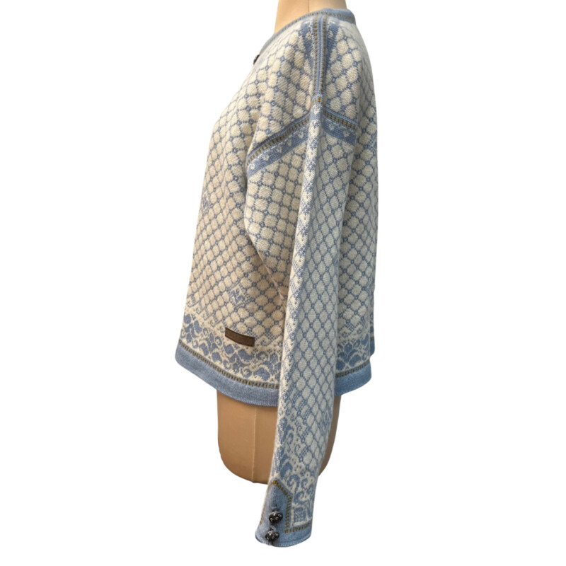 Dale Of Norway Cardigan<br />
Designed and knitted in Norway<br />
Pure New Wool<br />
Color: Sky Blue, Cream, and Dijon<br />
Size: Large