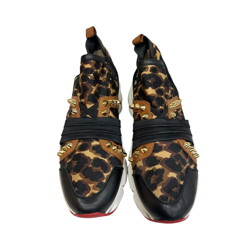 Christian Louboutin 123 Run Sneakers<br />
<br />
Size 39<br />
<br />
Leopard print satin<br />
<br />
Black & brown leather<br />
<br />
Rear pull strap of right shoe is torn<br />
<br />
Rear pull strap of left shoe is stained<br />
<br />
Does not come with original dust bag or box