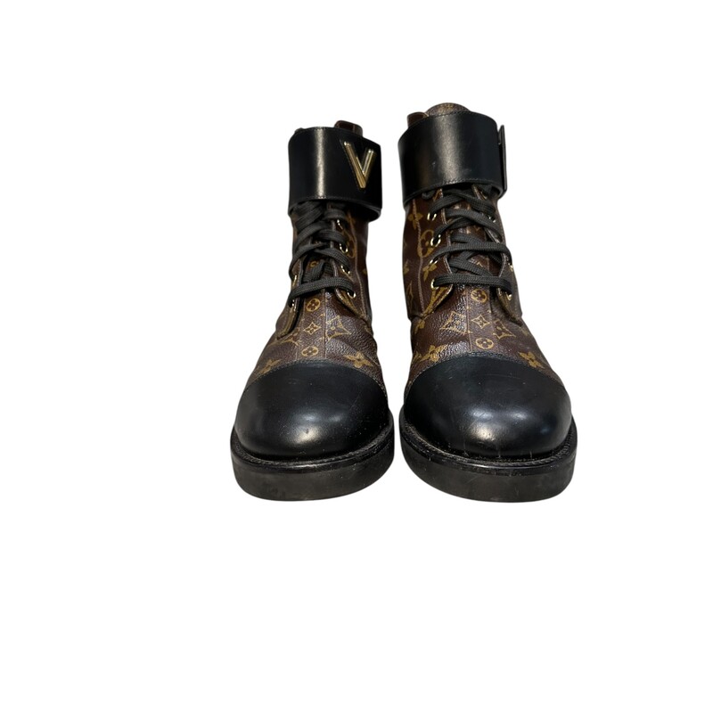 Louis Vuitton Wonderland Monogram Ranger Boots<br />
Size 41<br />
Code: NL0197<br />
Some scratches on leather<br />
Does not come with original dust bag or box.