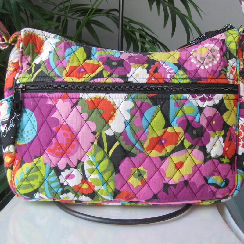 Vera Bradley Crossbody, Purple, Size: None<br />
Adjustable roomy crossbody bag from vera bradley in Va Va Bloom (2012) a vibrant dark floral<br />
large zip pocket and two side pockets outside<br />
One side of the interior is lined in a slick fabric and has two slip pockets,<br />
the other side is quilted cotton and it has a zippered pocket.<br />
11 x 8.25 x 4<br />
strap adjusts from 11 minimum to 23 maximum.<br />
excellent condition!<br />
thanks for looking!<br />
#79331