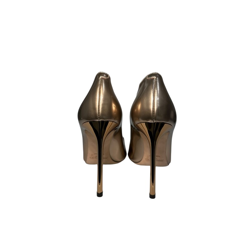 Jimmy Choo Abel Pump<br />
Bronze<br />
Size: 39<br />
<br />
Light scuffing to the heels.<br />
 Does not include the original dust bag or box.