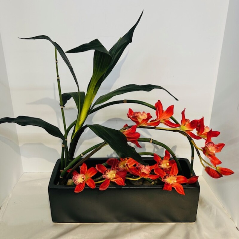 Orchid In Lacquered Rocks
Red Green in Black Ceramic Planter
Size: 13x5x17H
Very Realistic