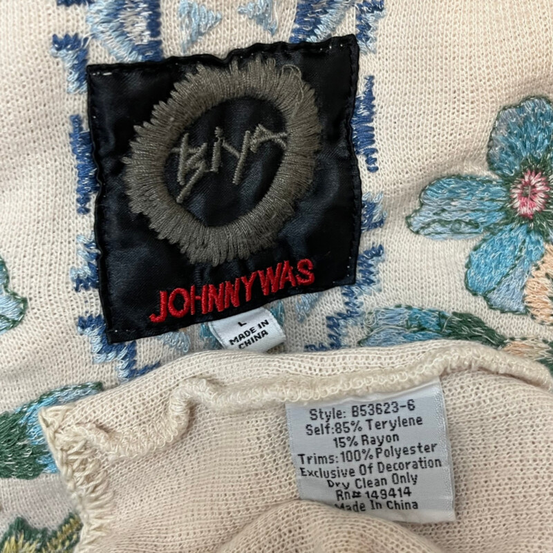 Johnny Was Cradigan<br />
Embroidered Floral Detail<br />
With Pockets<br />
Waterfall Opening<br />
Cream with Green, Blues, Pink and yellow<br />
Size: Large