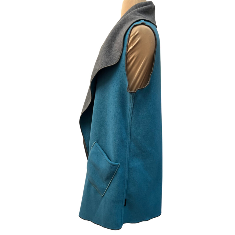 NWOT Mia Reis Fleece Vest
Reversible
Colors: Turquoise and Gray
Size: Small
Retails for $158.99